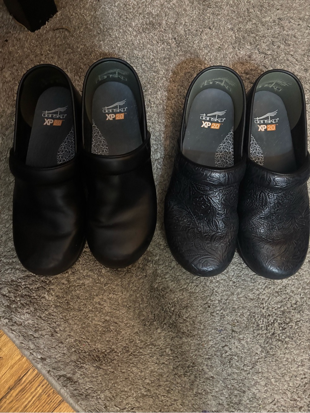 Dansko Black Leather and Embossed Black Slip-On Clogs Duo